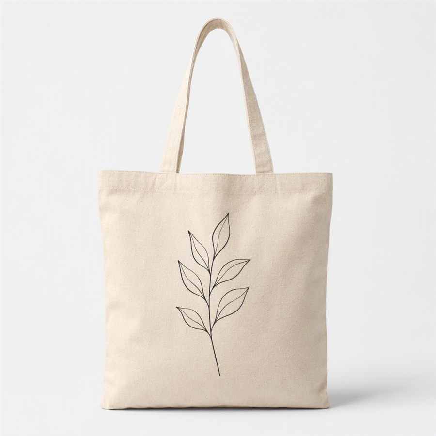 Natural canvas tote with a single leaf line print
